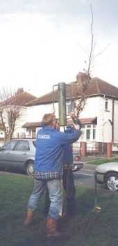 Elm Tree Corner - hammering in the post